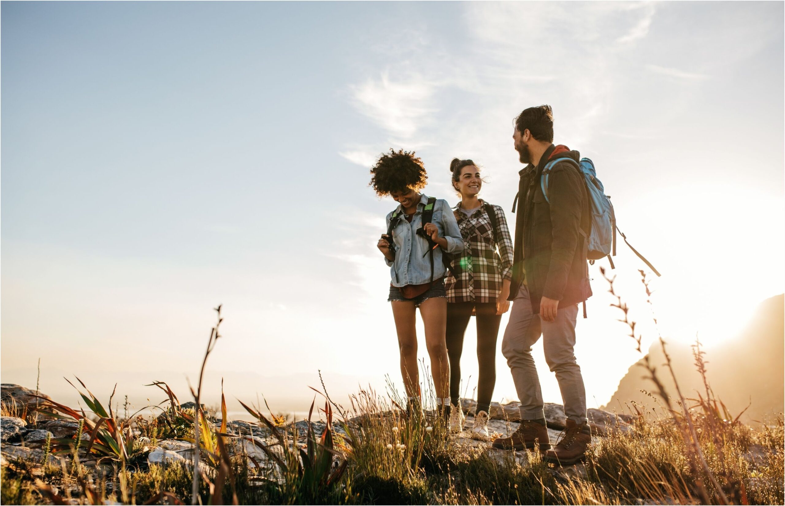 three people hiking